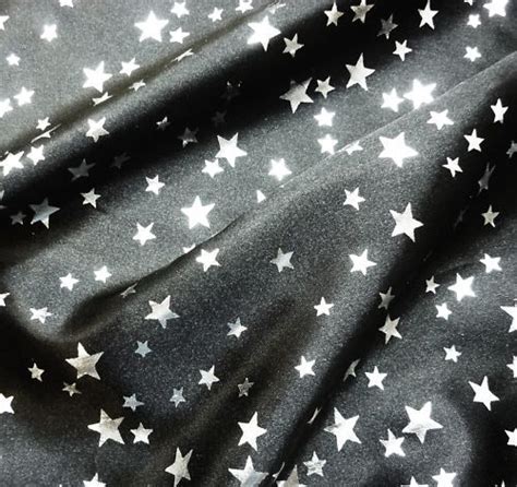 metallic silver fabric star|black fabric with stars.